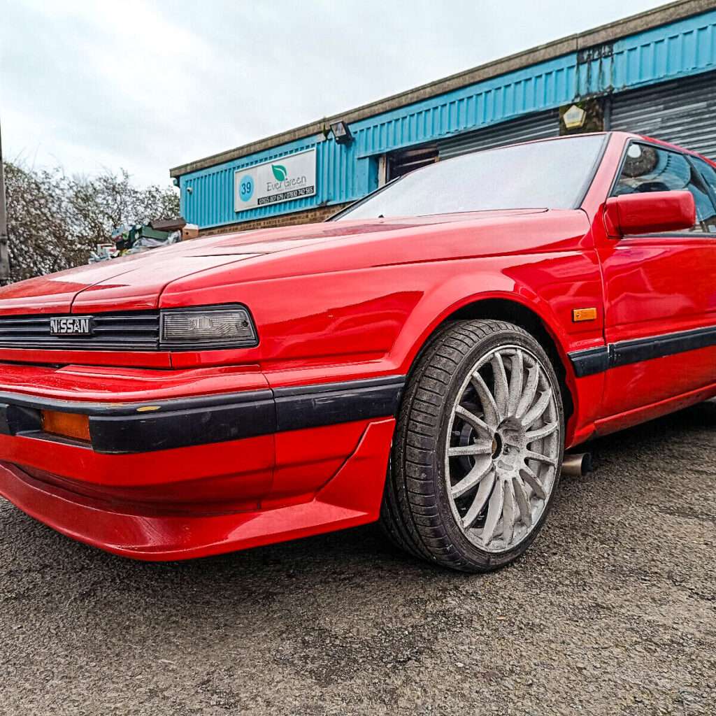 Red Nissan Silvia S12 Turbo with Rally Pack-style equipment