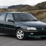 Dark green road-going Peugeot 405 T16 performance saloon
