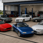 Replica and kit car donor vehicles outside a specialist workshop