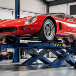 Buyer and specialist inspecting a used replica car underneath
