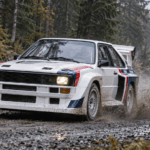 Audi Sport quattro-inspired Group B rally car on a wet forest stage