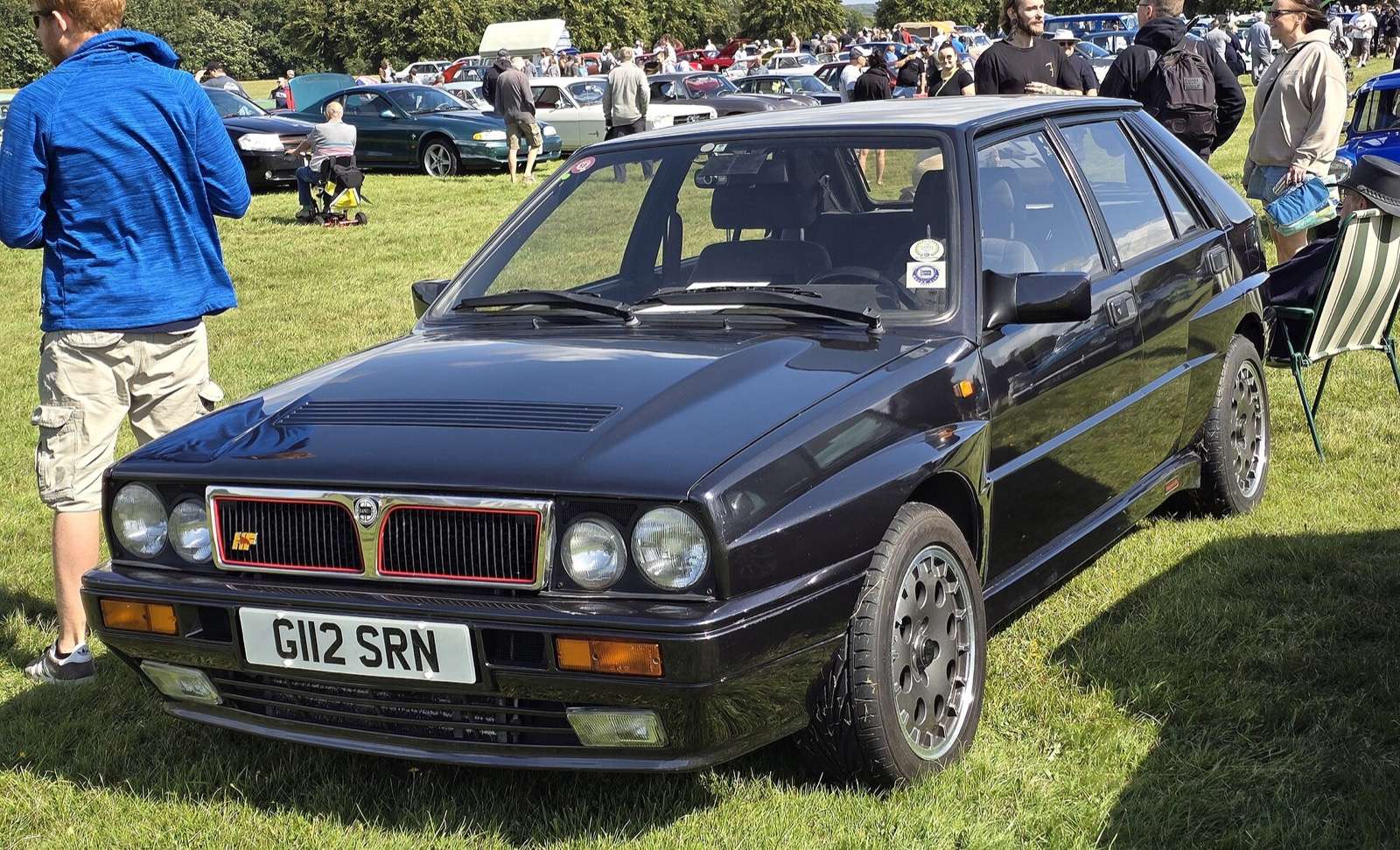 Dark blue Lancia Delta HF Integrale 16V at a classic car show