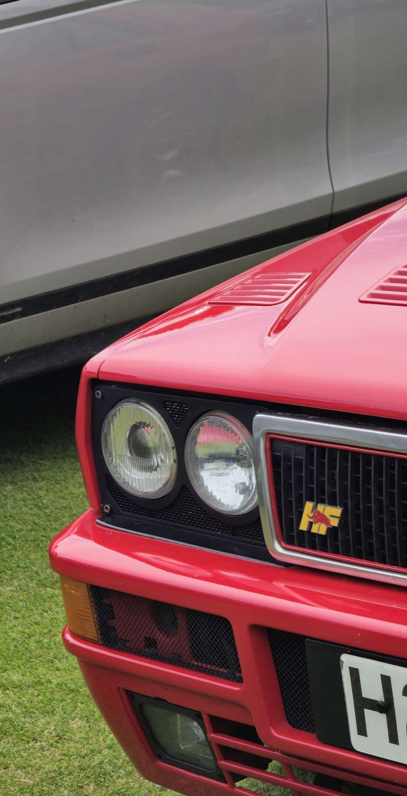 Close-up of the HF elephant badge, grille and bonnet vents on a Lancia Delta Integrale Evoluzione