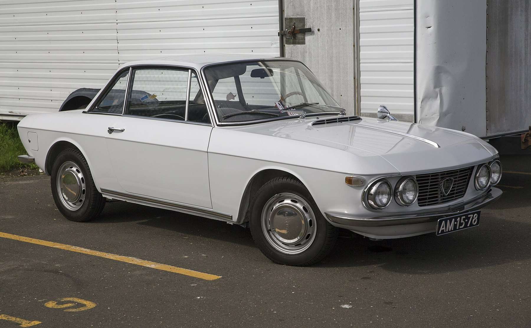White 1968 Lancia Fulvia Series I Coupé viewed from the front right
