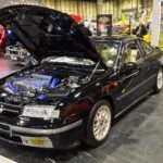 Black Vauxhall Calibra displayed with its bonnet open