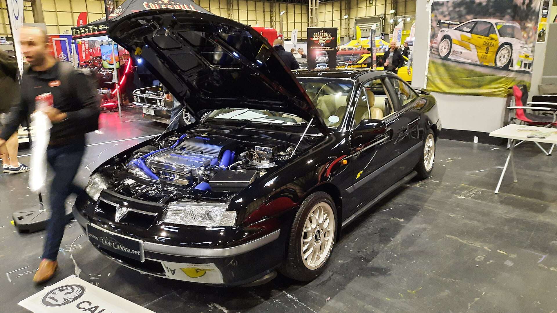 Black Vauxhall Calibra displayed with its bonnet open