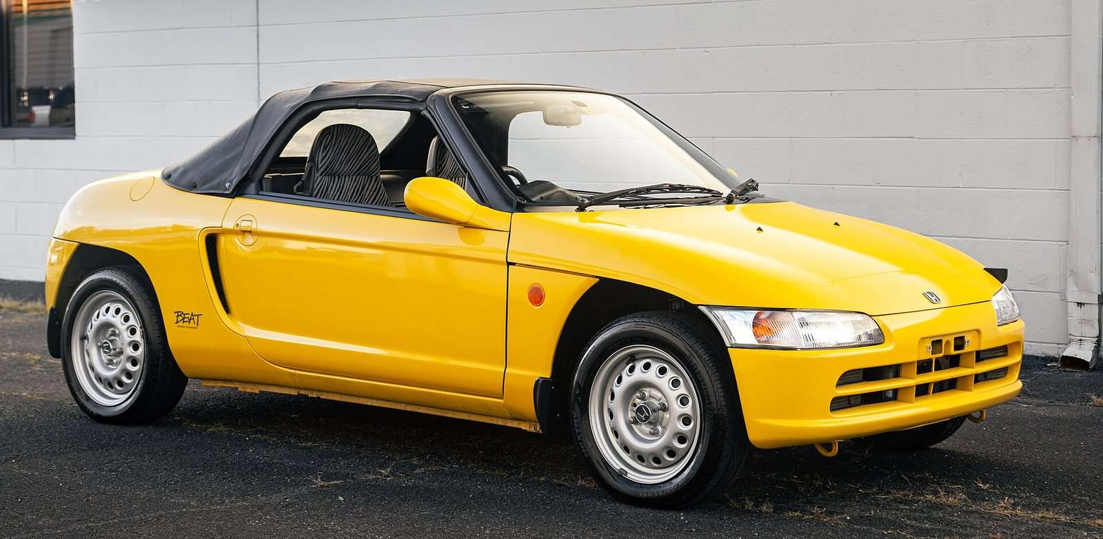 Yellow Honda Beat PP1 front three-quarter view
