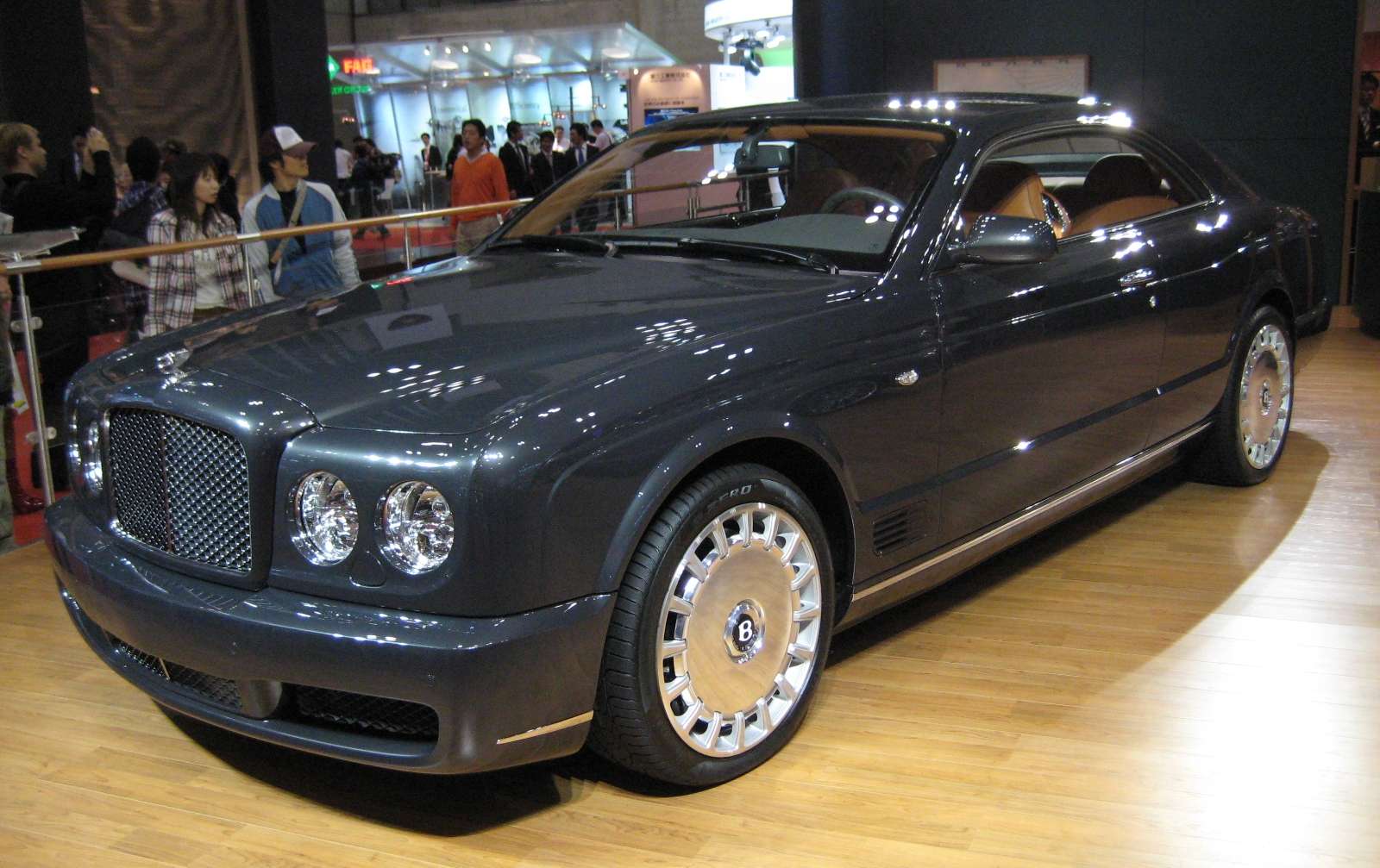 Dark blue Bentley Brooklands Coupé front three-quarter
