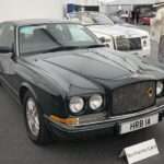 Dark green Bentley Continental R front three-quarter