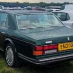 Green Bentley Turbo R rear three-quarter