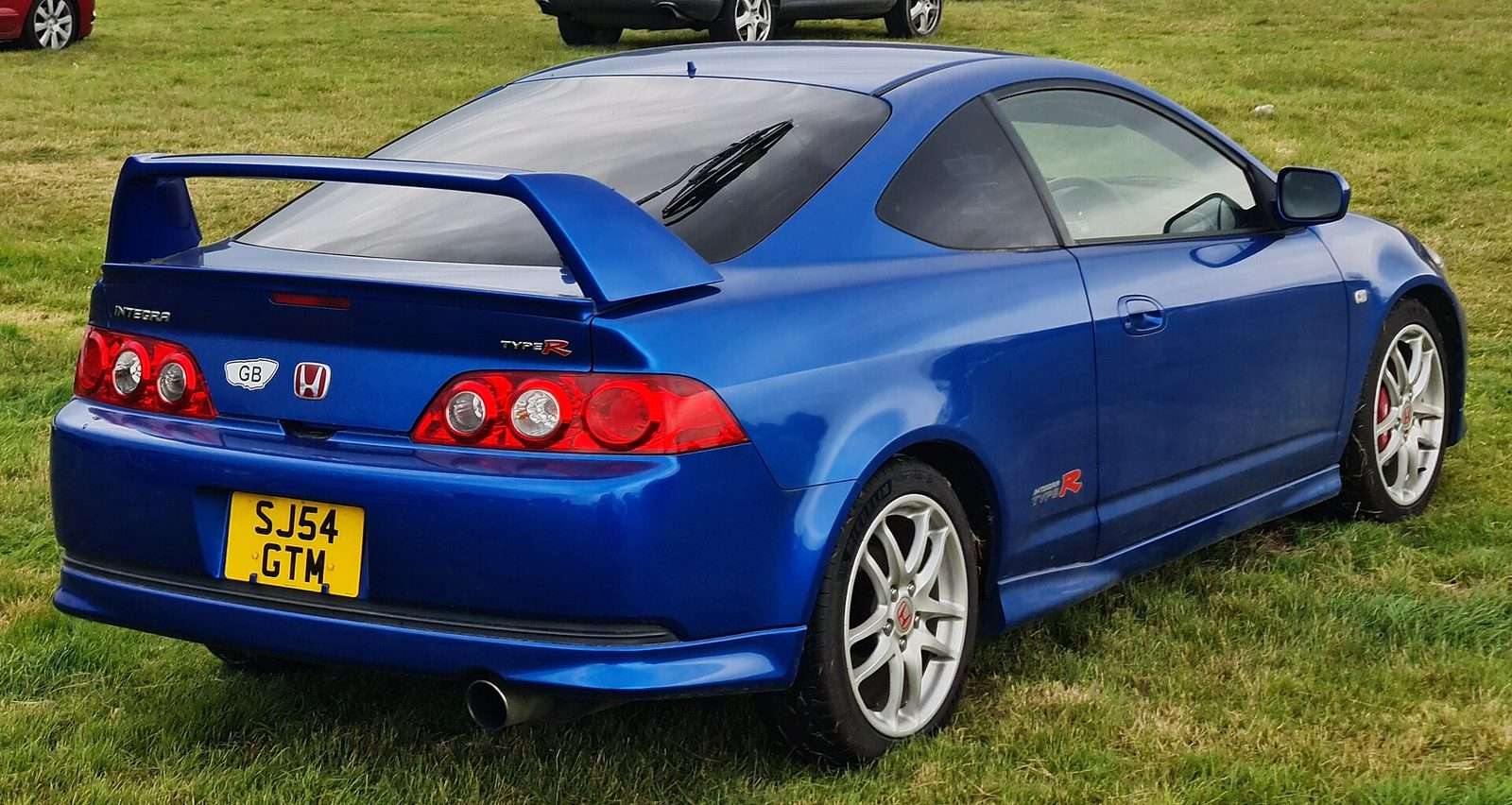 Blue pre-facelift Honda Integra Type R DC5 rear three-quarter view