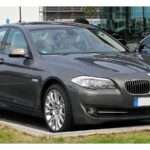 BMW Pre-facelift F10 520d Saloon, front three-quarter view
