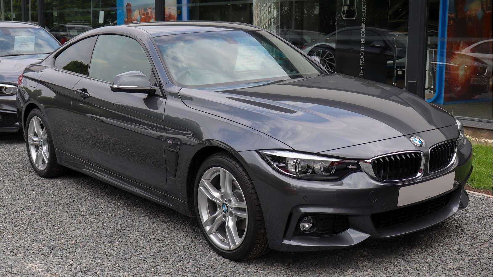 BMW 2018 F32 420i M Sport Coupé, front three-quarter view