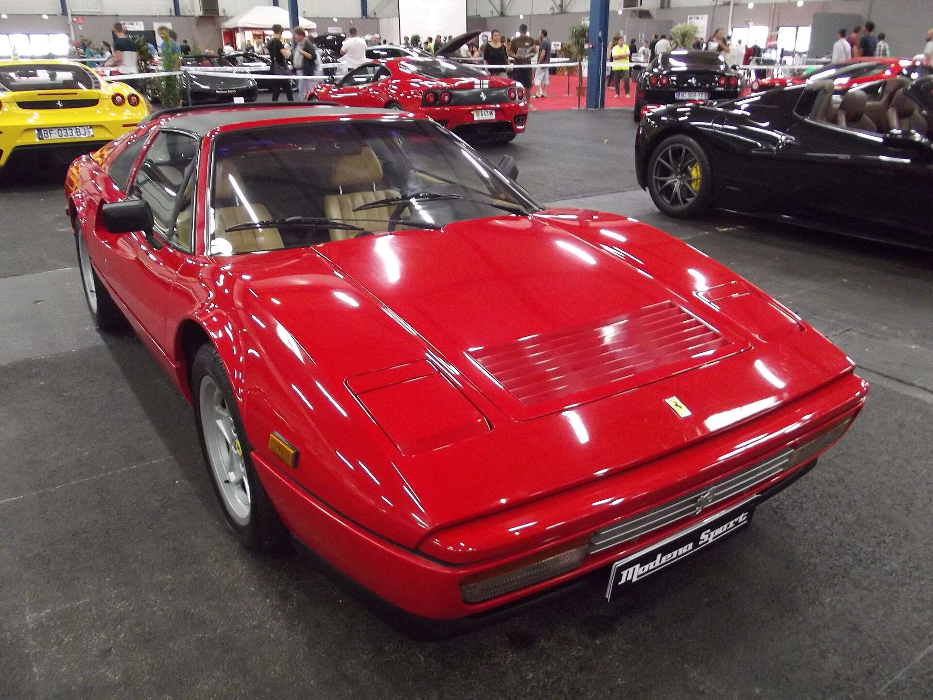 Red Ferrari 328 GTS front three-quarter