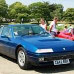 Blue 1986 Ferrari 412 front three-quarter