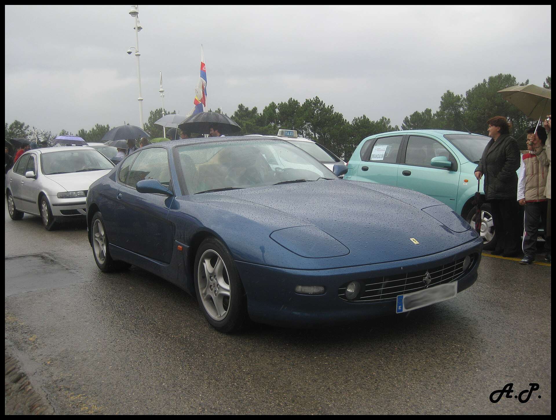 Blue Ferrari 456M GT front three-quarter