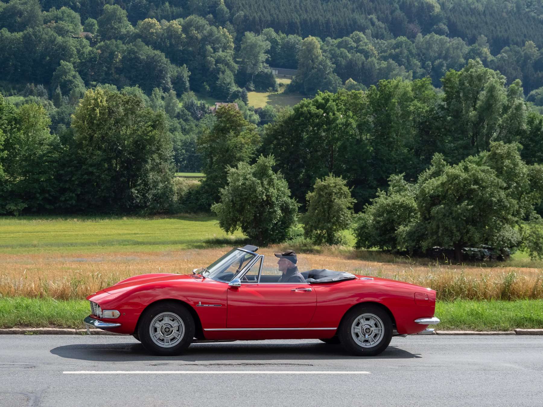 Red Fiat Dino Spider in side profile