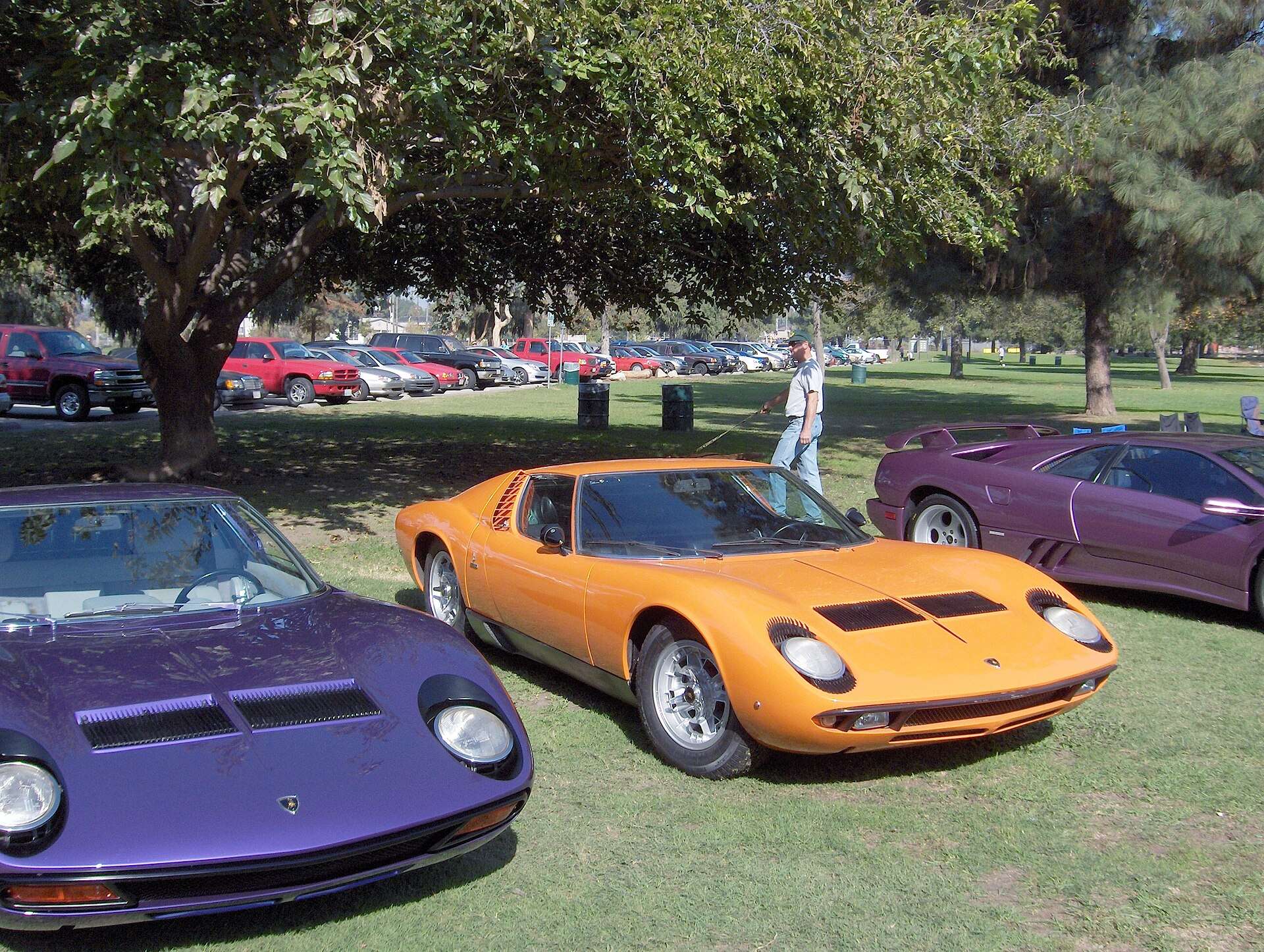 Two classic Lamborghini Miuras representing the Rare and Performance Lamborghini hub