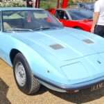 Light blue 1970 Maserati Indy front three-quarter