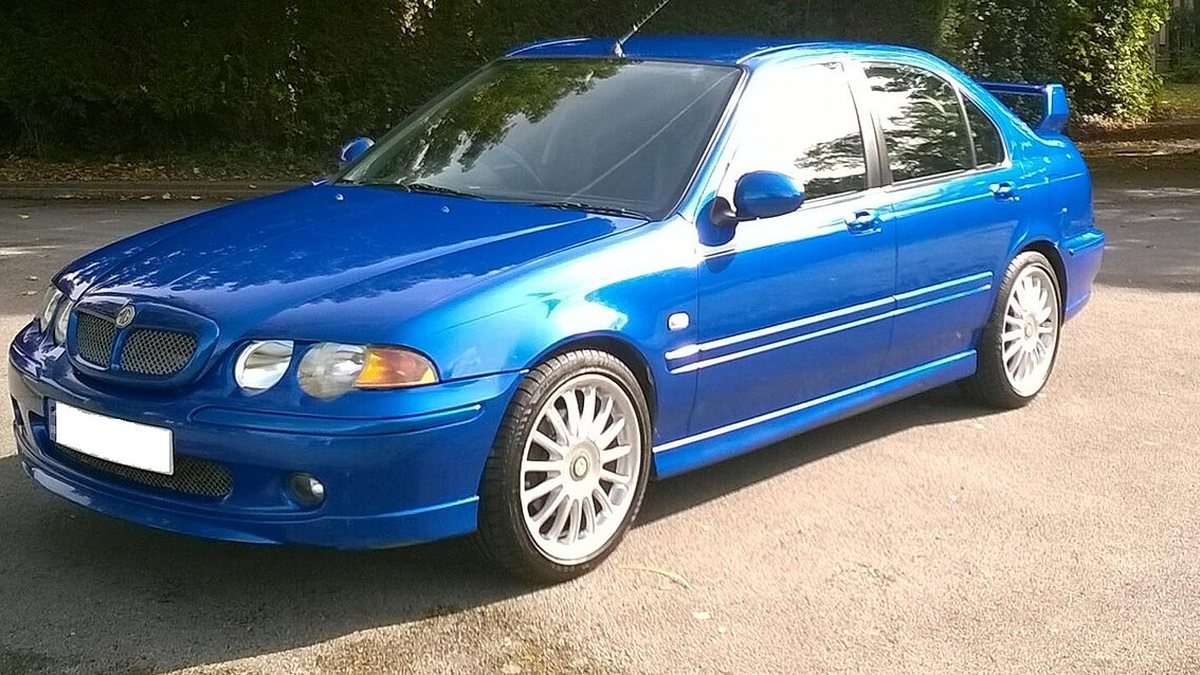 Trophy Blue MG ZS 180 front three-quarter view