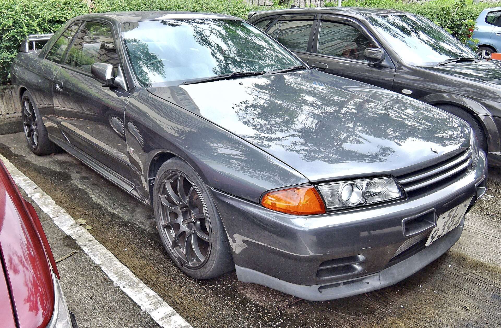 Gunmetal Nissan Skyline GT-R R32 front three-quarter view