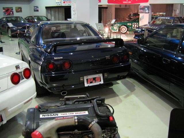 Black Nissan Skyline GT-R R32 rear three-quarter view