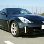 Black Nissan 350Z Z33 coupé, front three-quarter view