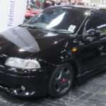 Black 1998 Fiat Punto GT viewed from the front three-quarter angle