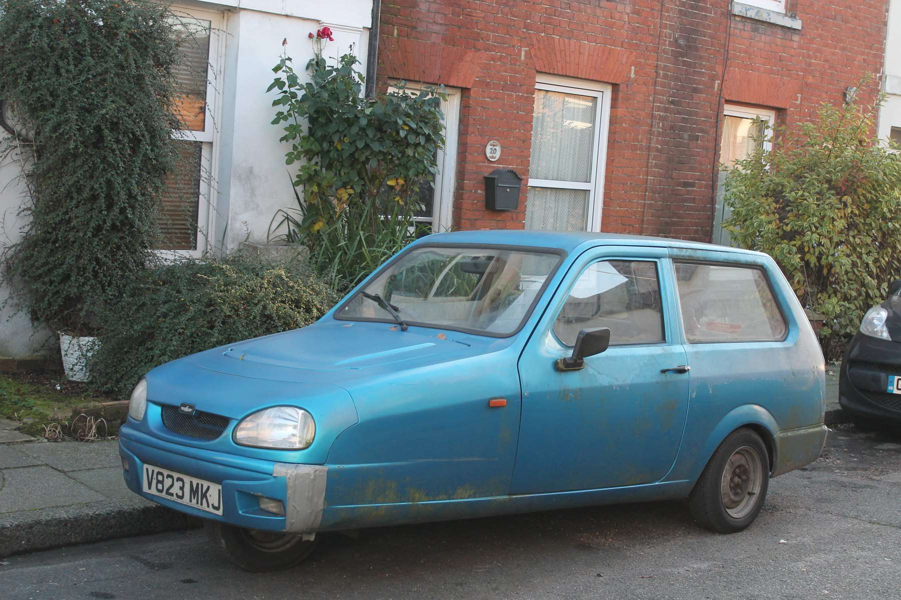 Late Reliant Robin Mk II parked on a British street