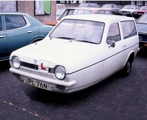 Early Reliant Robin estate side view