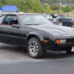 Black 1983 Toyota Celica Supra A60 front three-quarter view