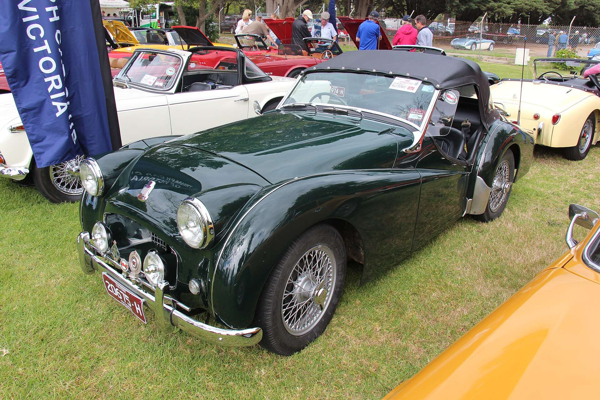 Green 1954 Triumph TR2 roadster front three-quarter view