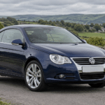 Dark blue Volkswagen Eos on a British country road — illustrative artwork