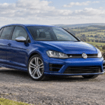 Blue Volkswagen Golf R Mk7 / Mk7.5 on a British country road — illustrative artwork
