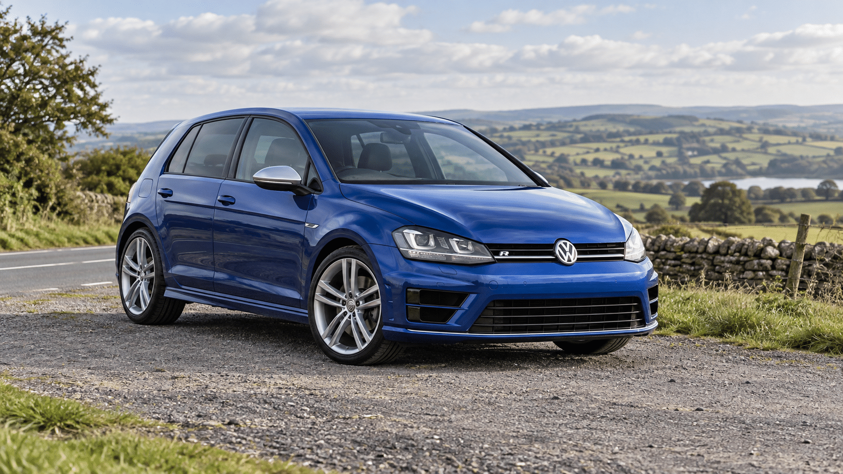 Blue Volkswagen Golf R Mk7 / Mk7.5 on a British country road — illustrative artwork