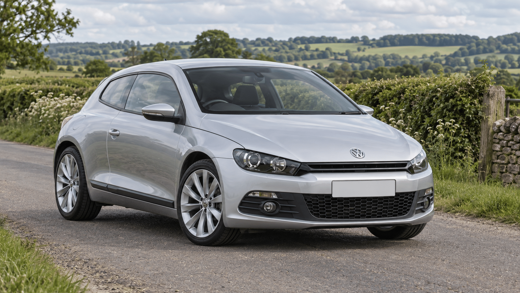 Silver Volkswagen Scirocco Mk3 on a British country road — illustrative artwork