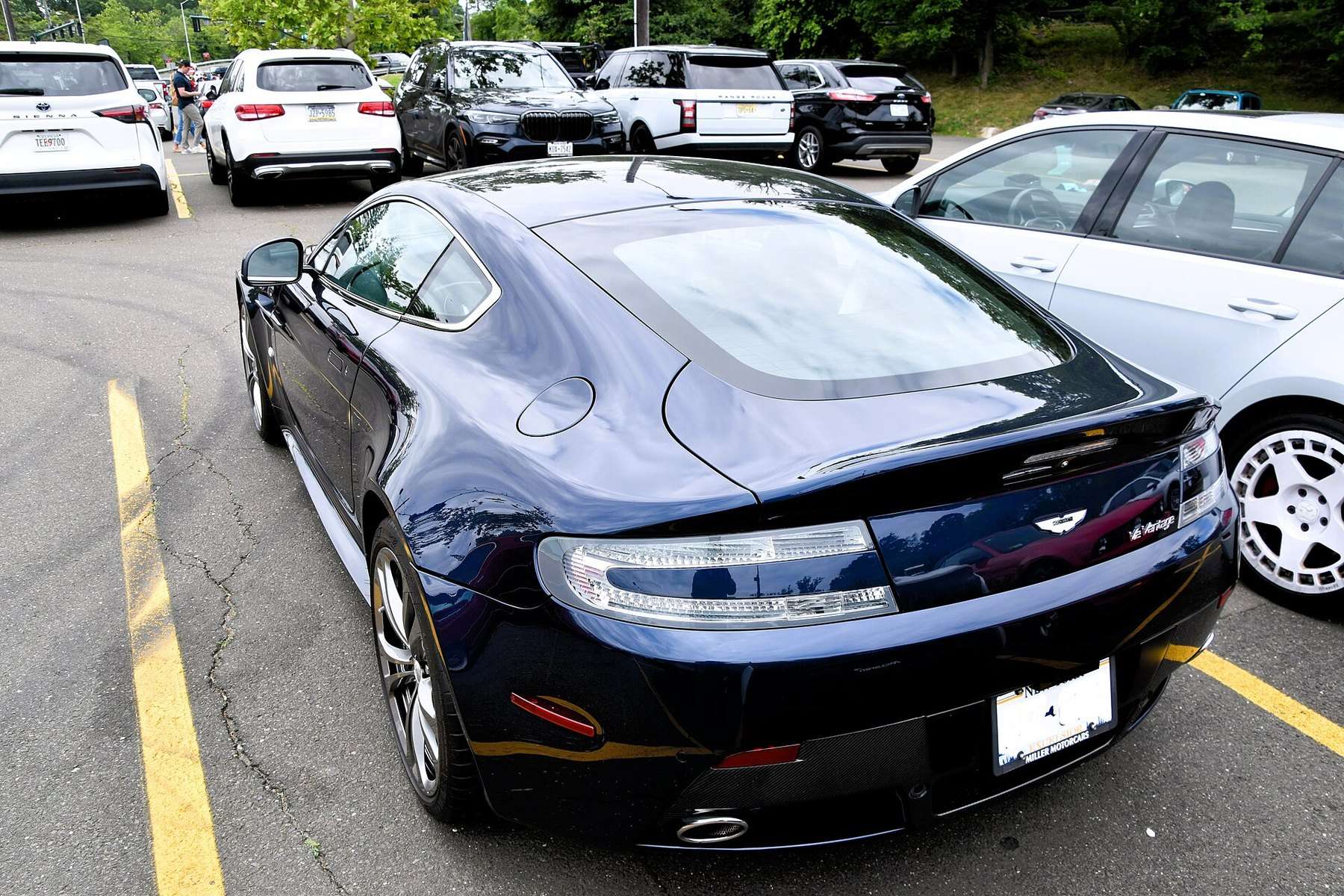 2012 Aston Martin V12 Vantage coupé rear three-quarter view